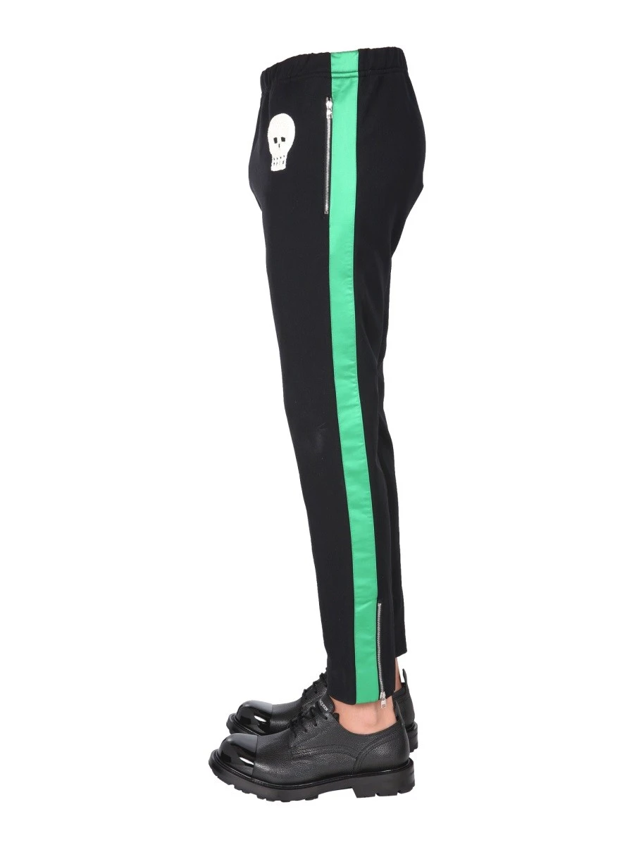 JOGGING PANTS WITH EMBROIDERED SKULL.webp