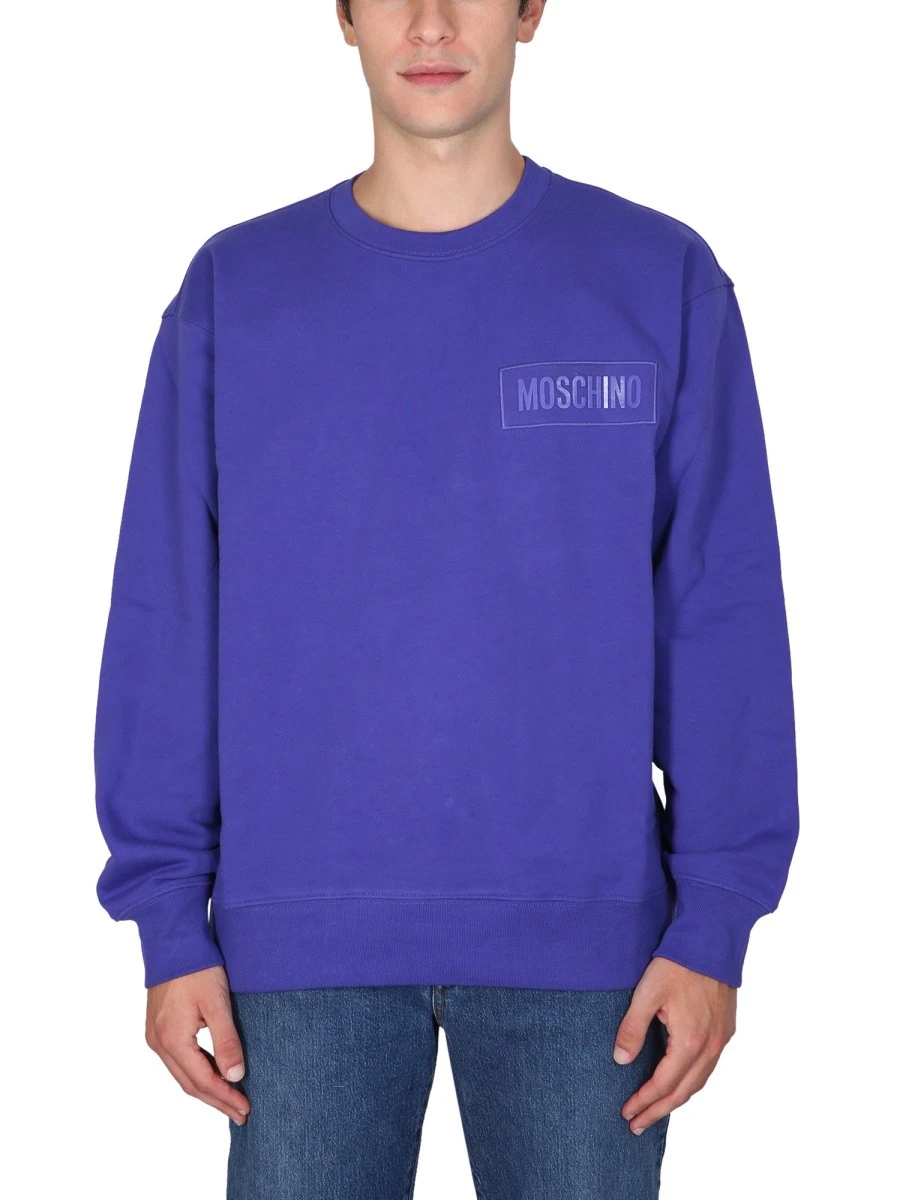 SWEATSHIRT WITH LOGO PATCH.webp