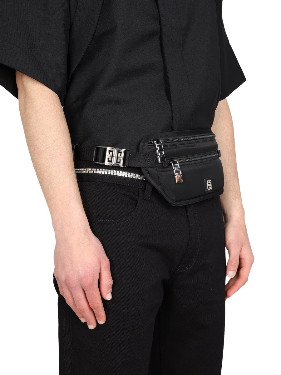 SLIM FIT JEANS WITH METALLIC DETAILS.webp