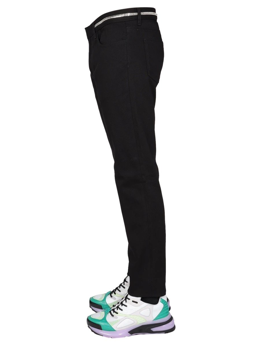 SLIM FIT JEANS WITH METALLIC DETAILS.webp