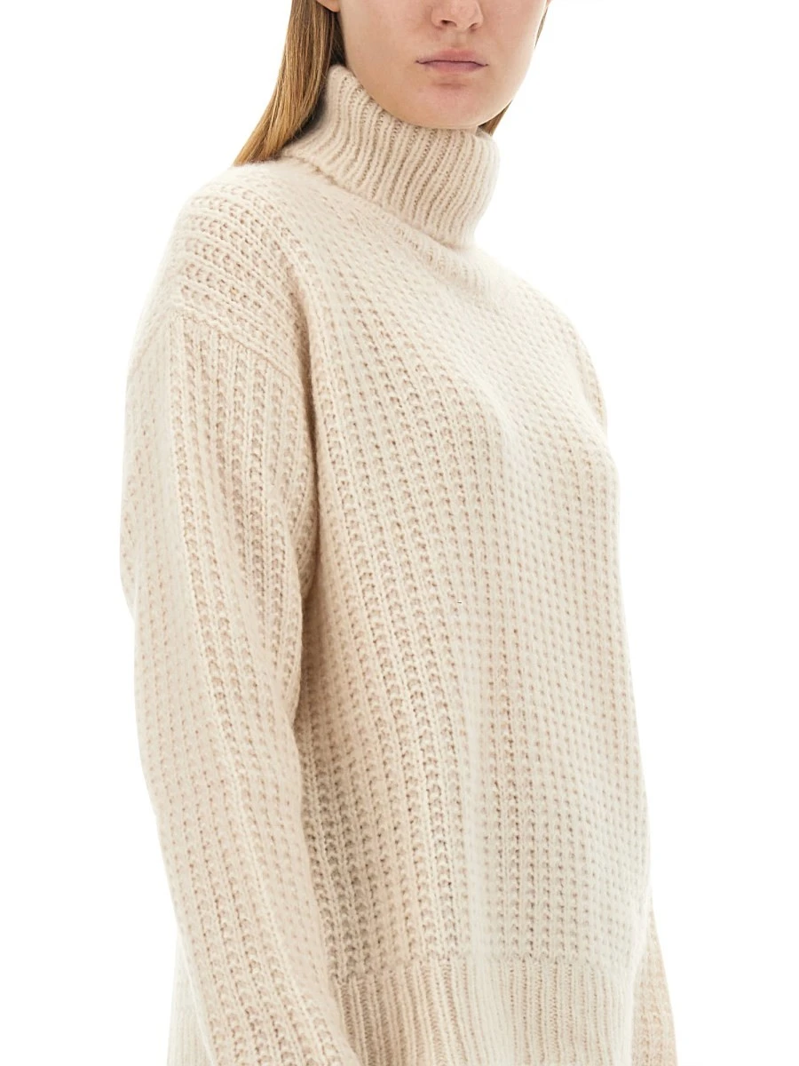 SILK AND CASHMERE TURTLENECK SWEATER.webp