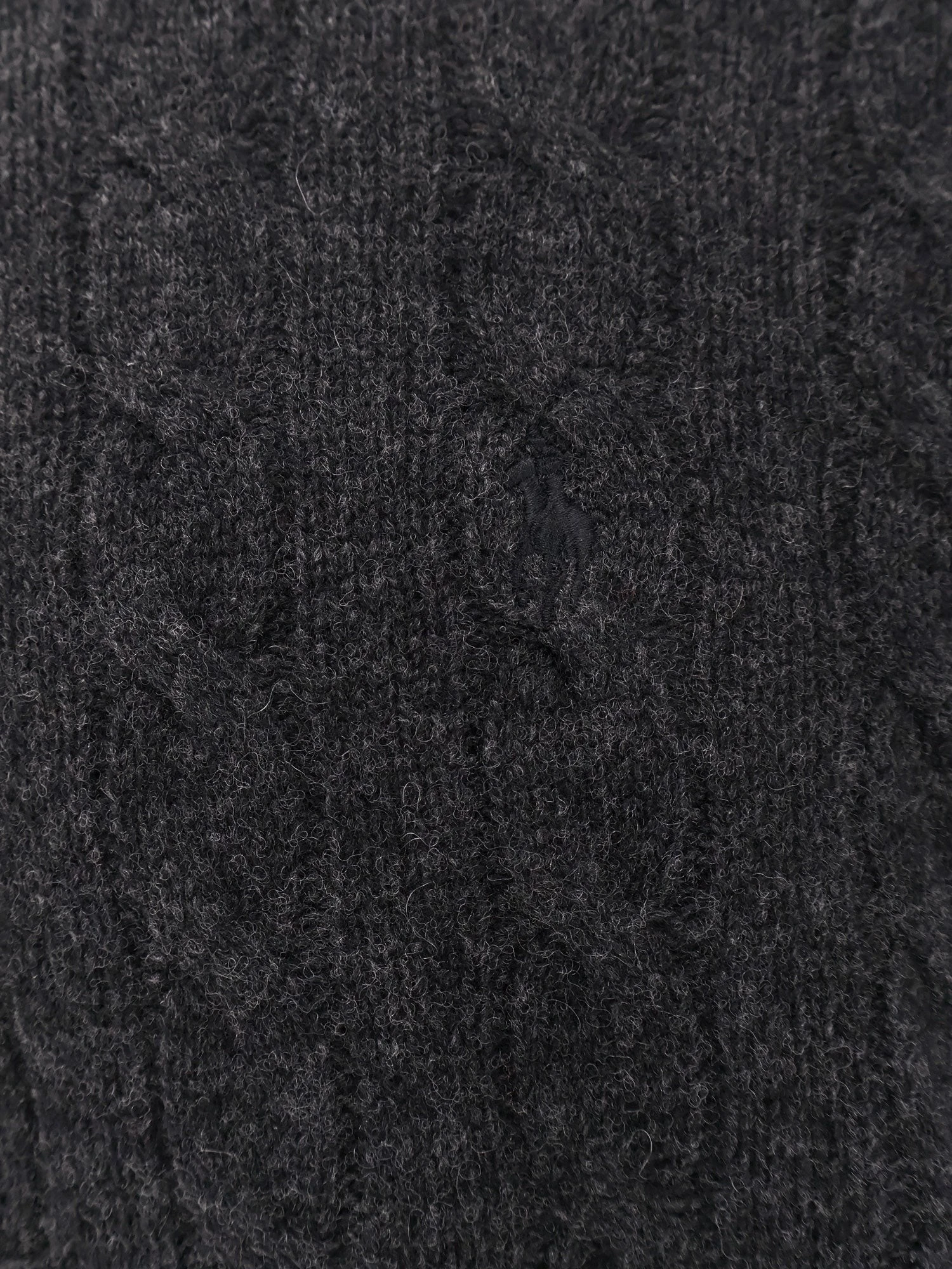 Wool and cashmere cable knit sweater.webp