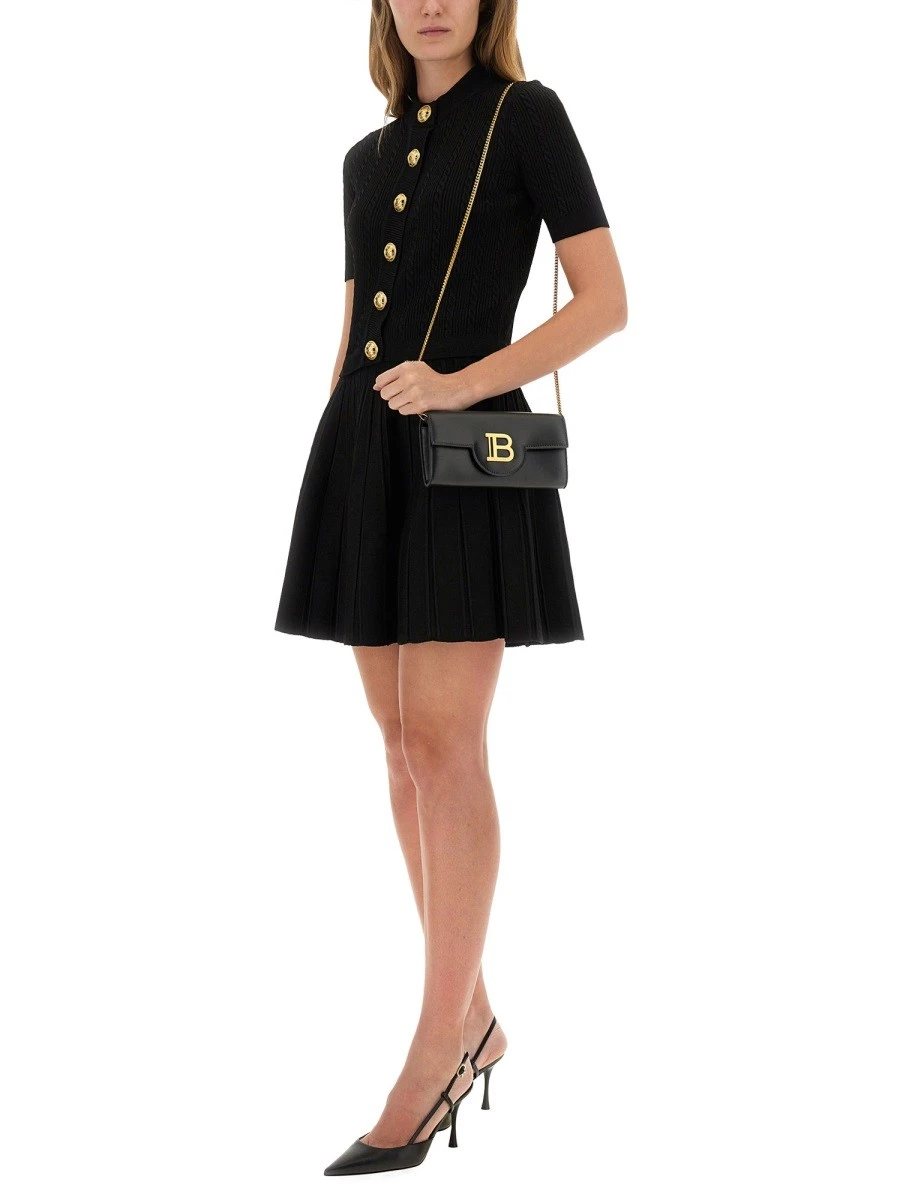 KNITTED CARDIGAN.webp