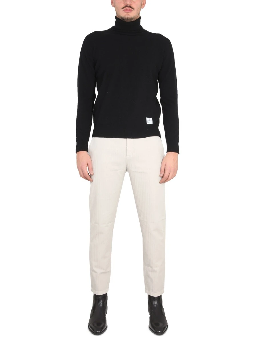 PANTS WITH LOGO PATCH.webp