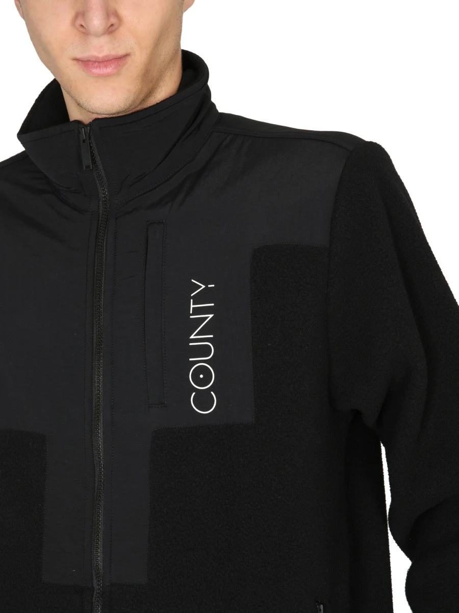 GIACCA TRACK CROSS BLOCK.webp