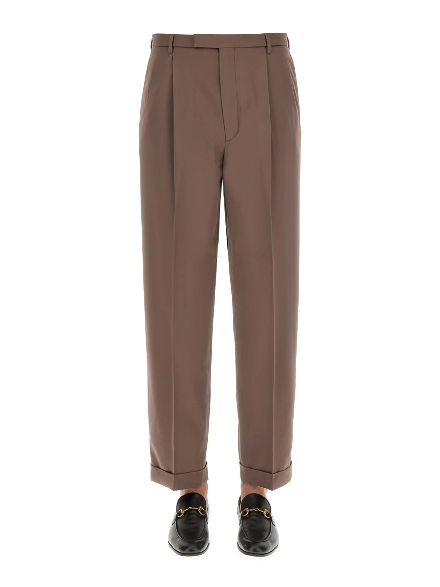 PANTS WITH GUCCI LABEL.webp