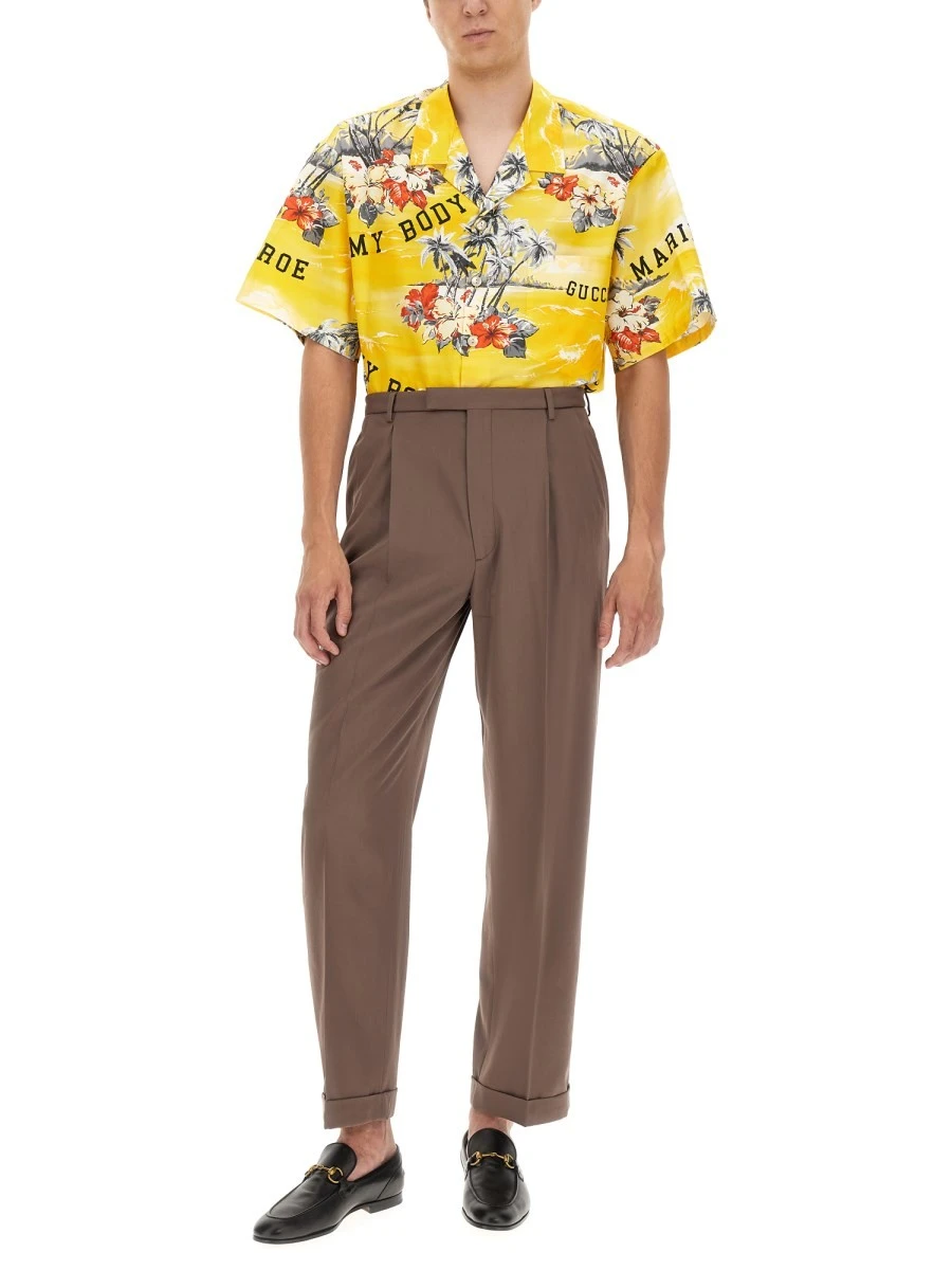 PANTS WITH GUCCI LABEL.webp