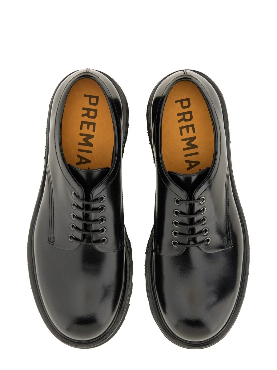 MOCCASIN "BINDER".webp