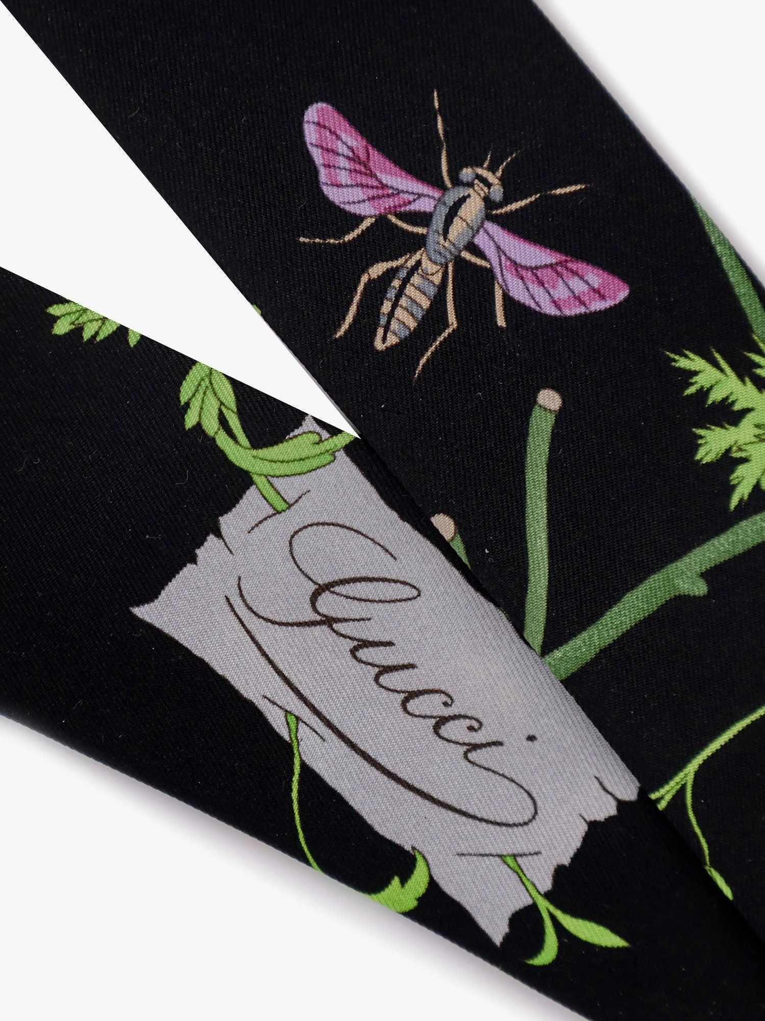 Silk twill bow with Gucci Flora print.webp
