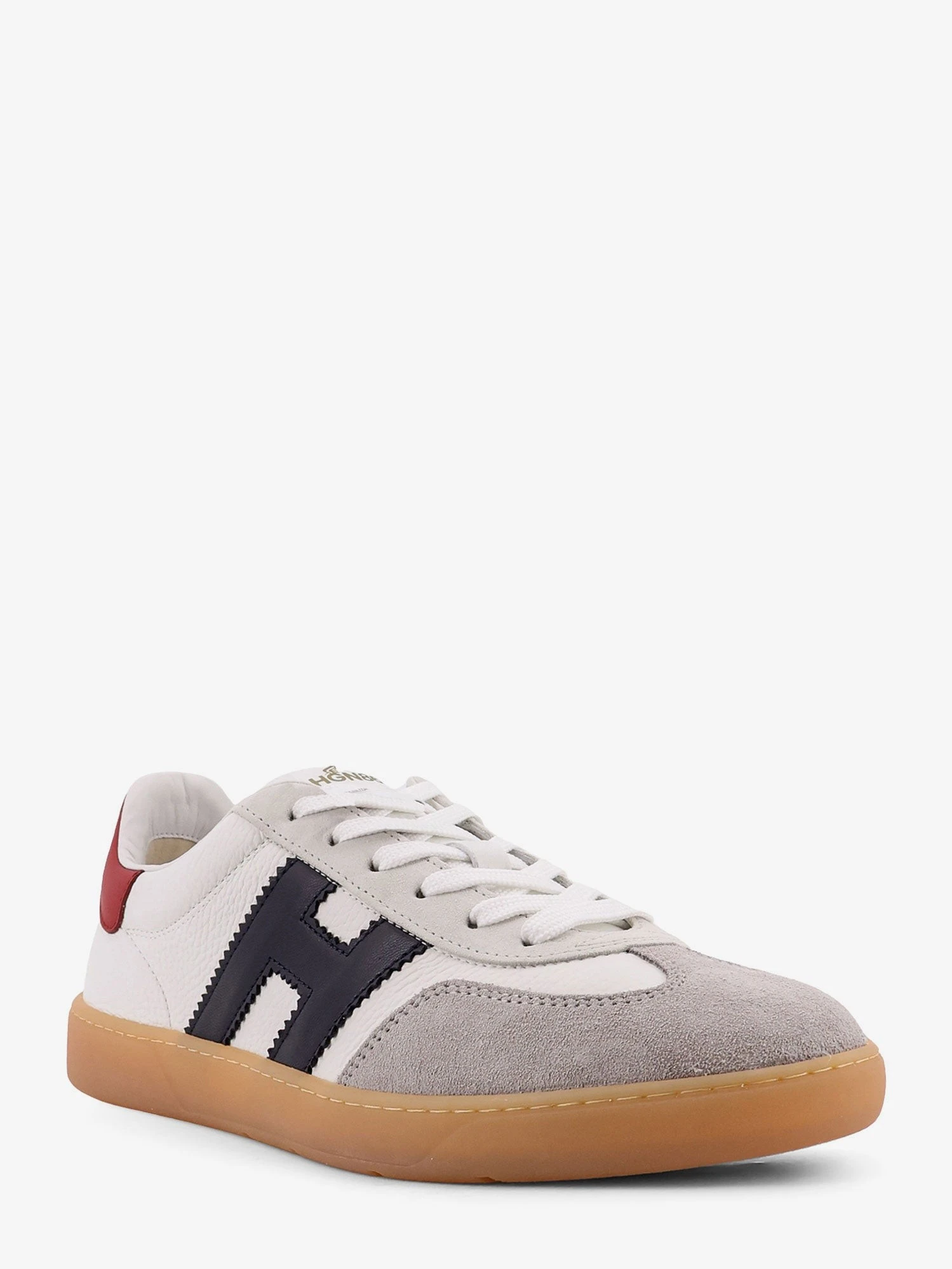 Leather sneakers with suede inserts.webp