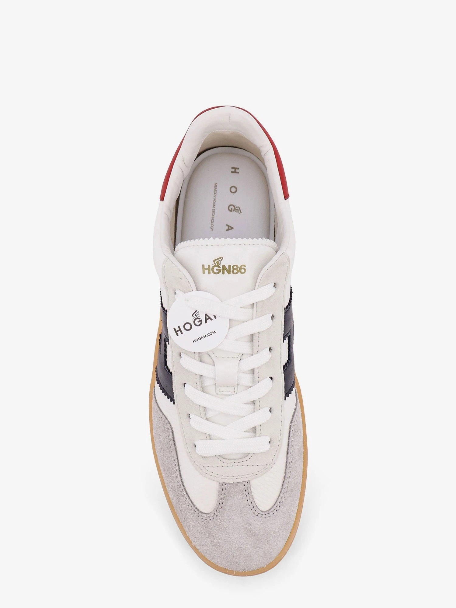 Leather sneakers with suede inserts.webp