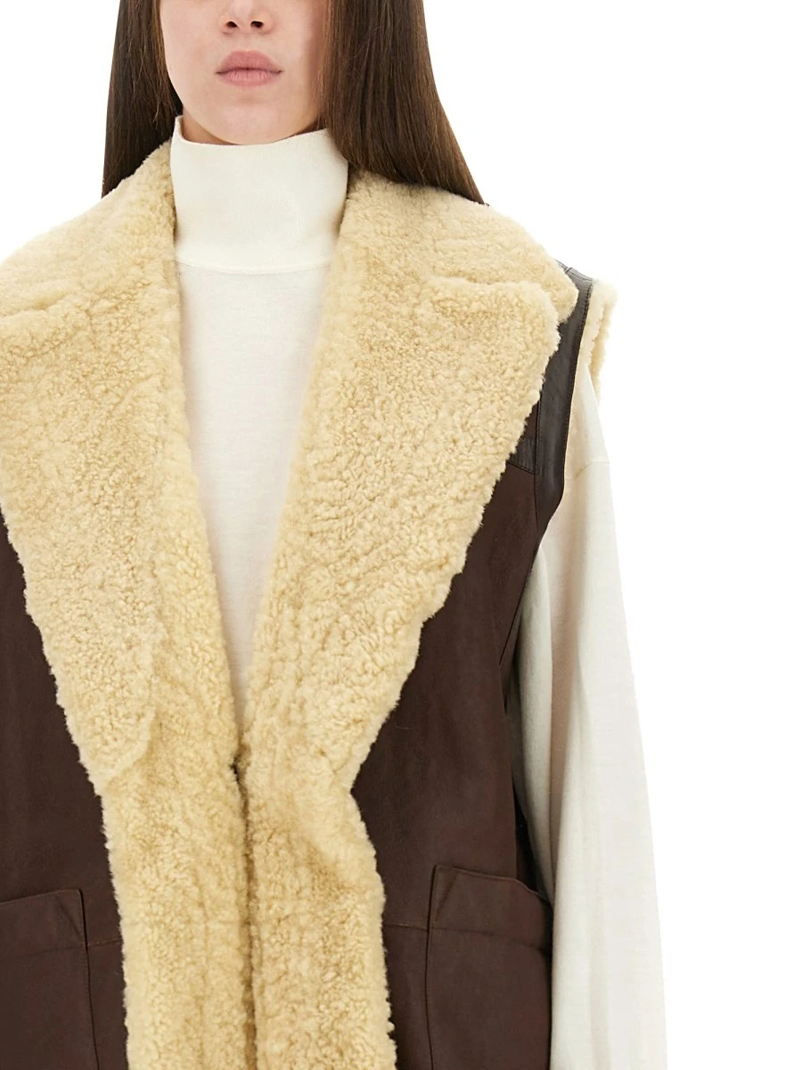 LEATHER AND SHEARLING VEST.webp