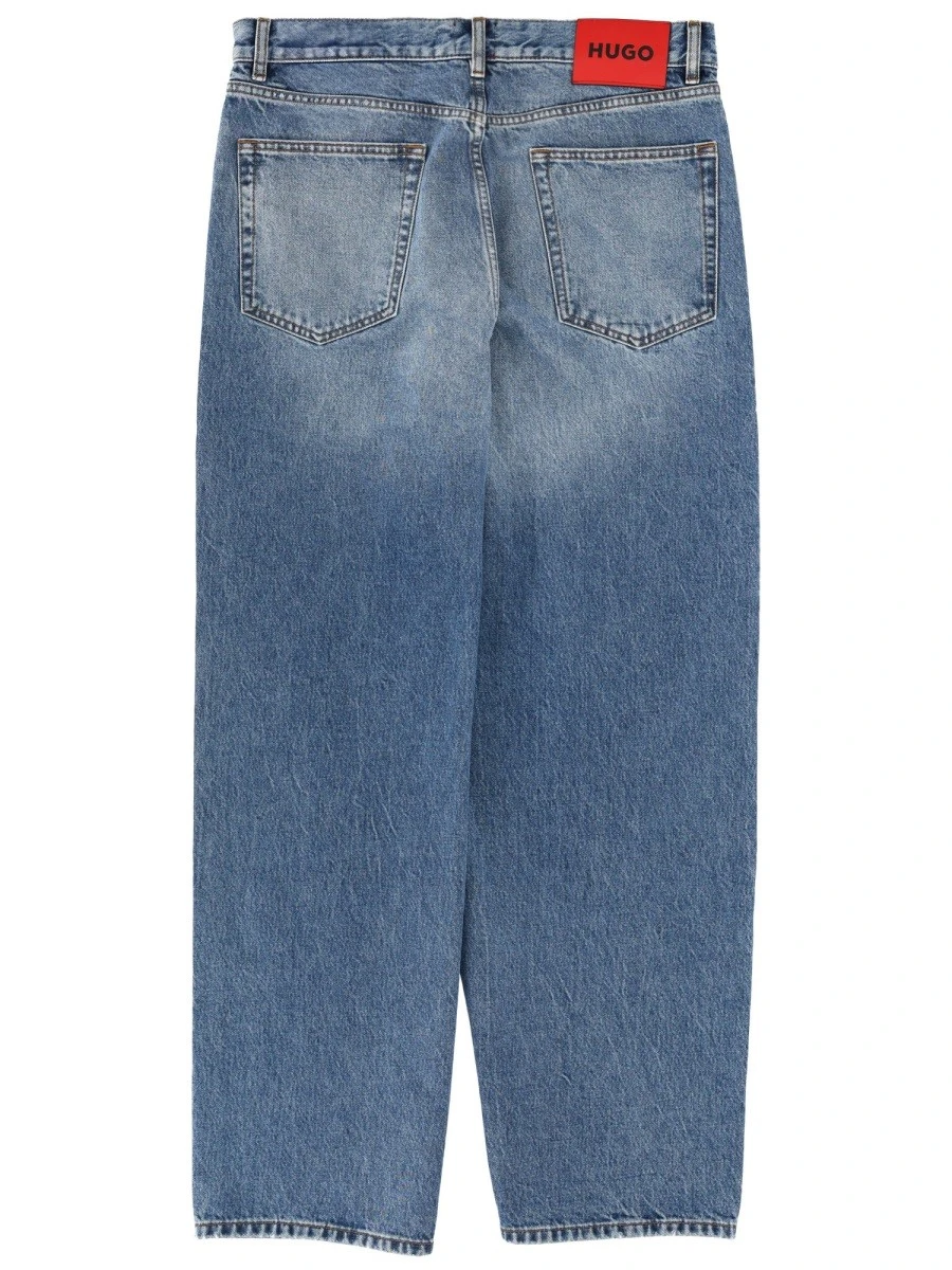 JEANS WITH LOGO PATCH.webp