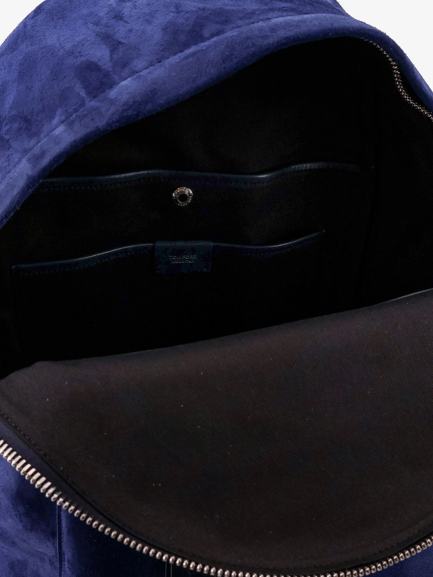 Suede backpack with maxi zip on the front.webp