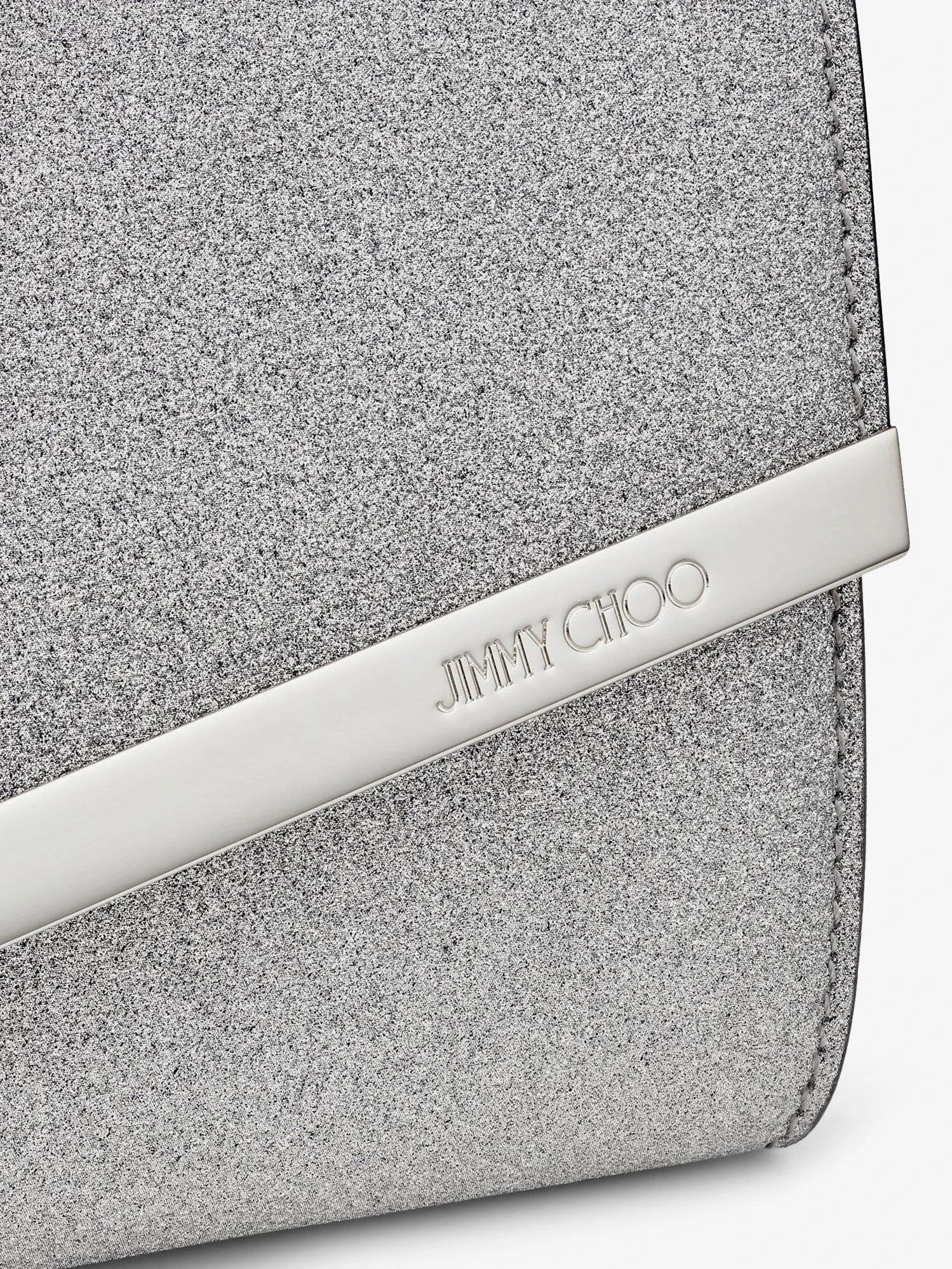 Emmie leather clutch in with glitter effect.webp