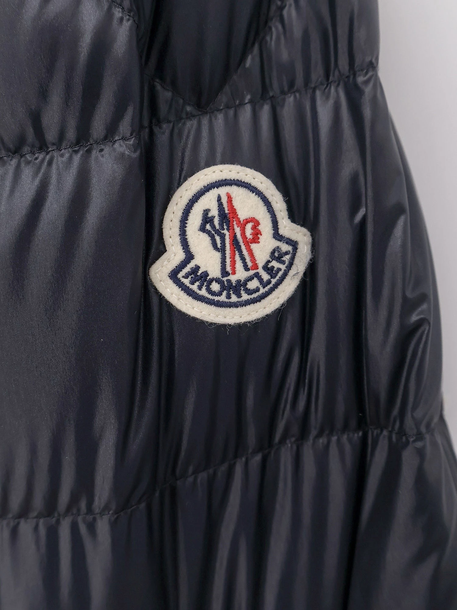 Selves down jacket with iconic patch.webp