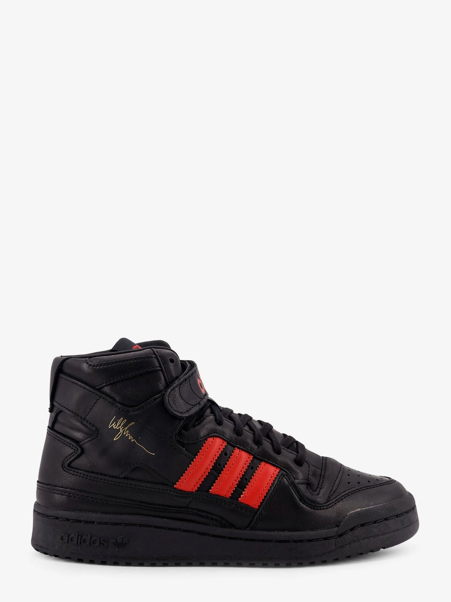 Leather sneakers with iconic logo on the side.webp