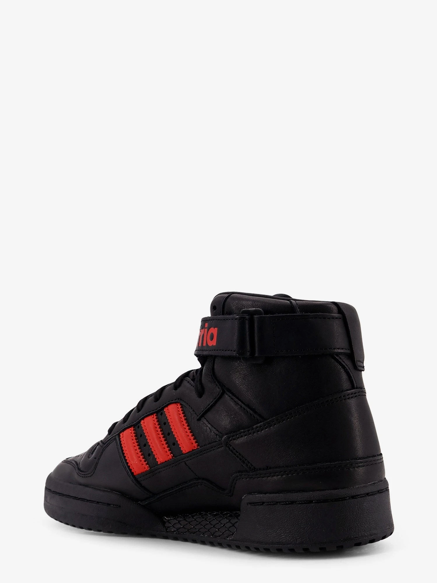 Leather sneakers with iconic logo on the side.webp