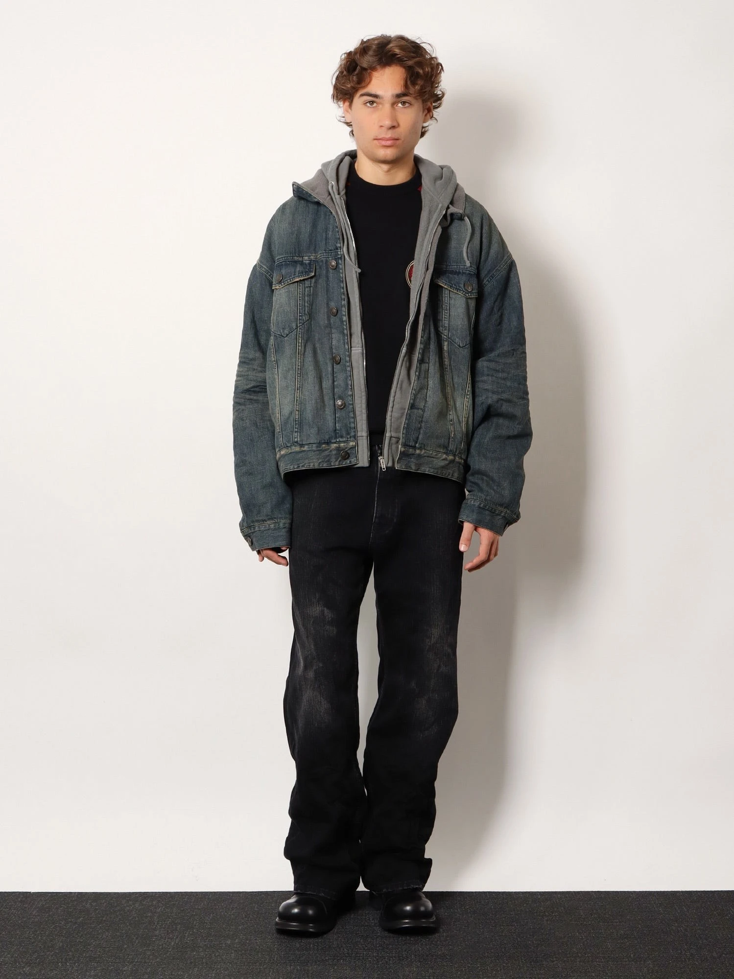 Black denim jeans.webp