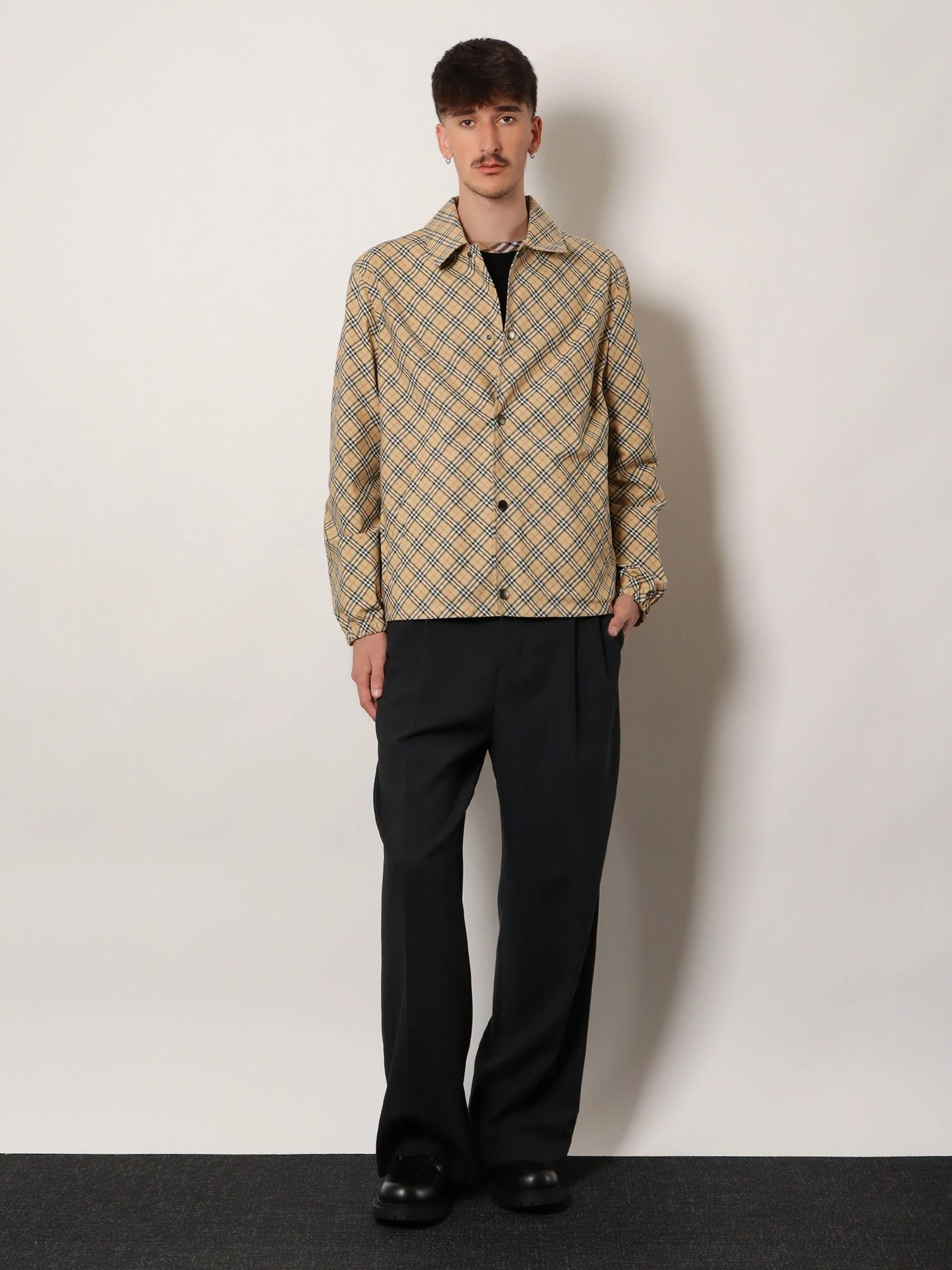 Slindon jacket with iconic Check motif.webp