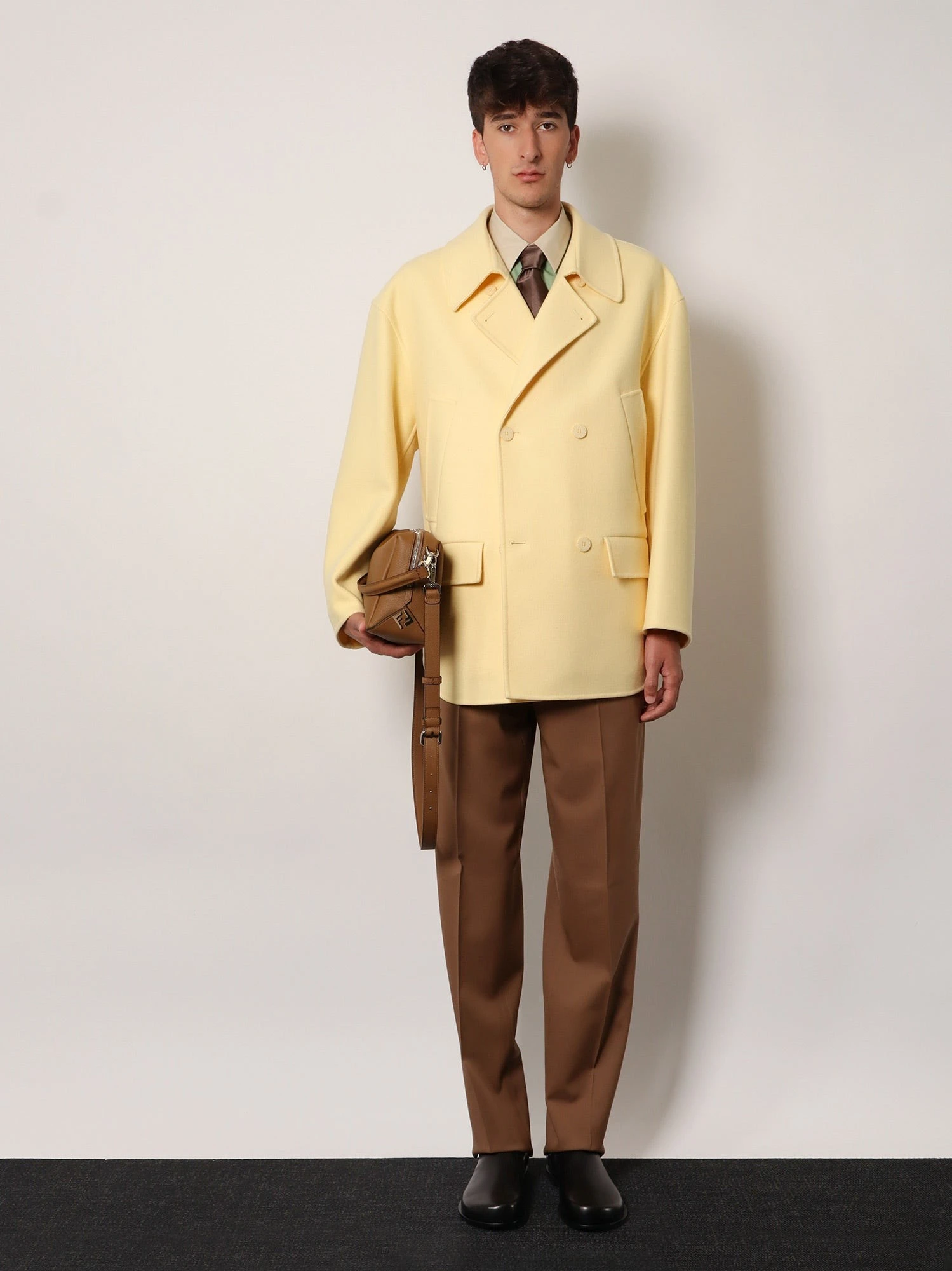 Double-breasted wool coat.webp