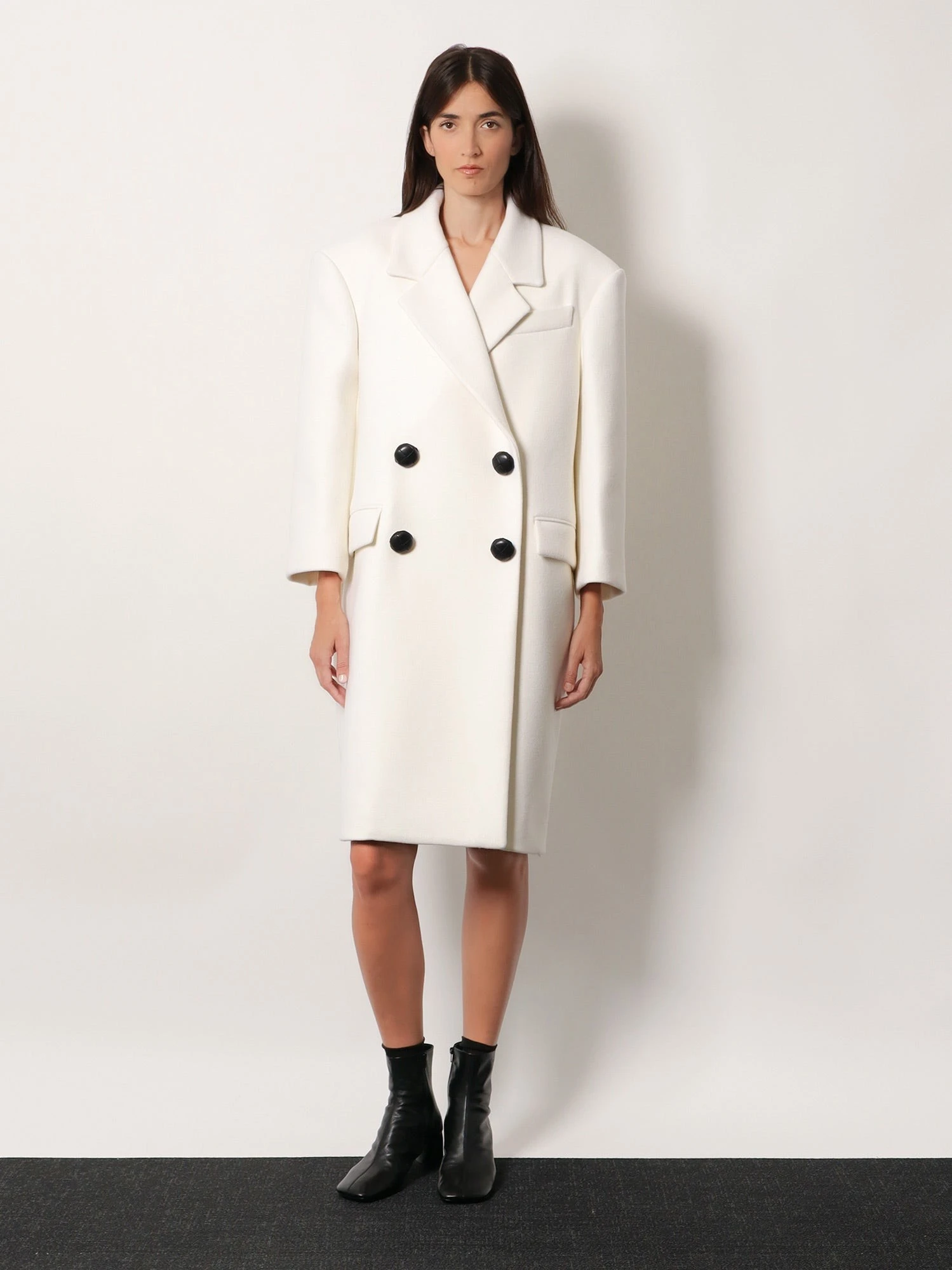 Double-breasted wool coat.webp