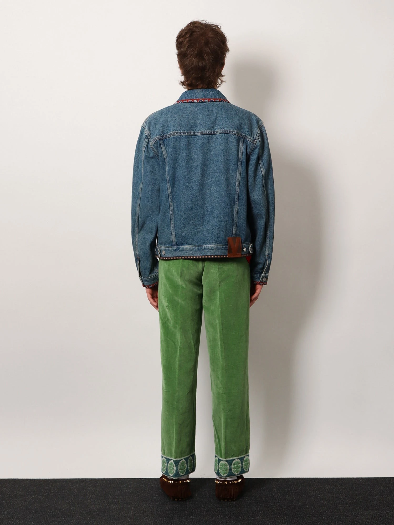 Denim jacket with multicolor embroidery.webp