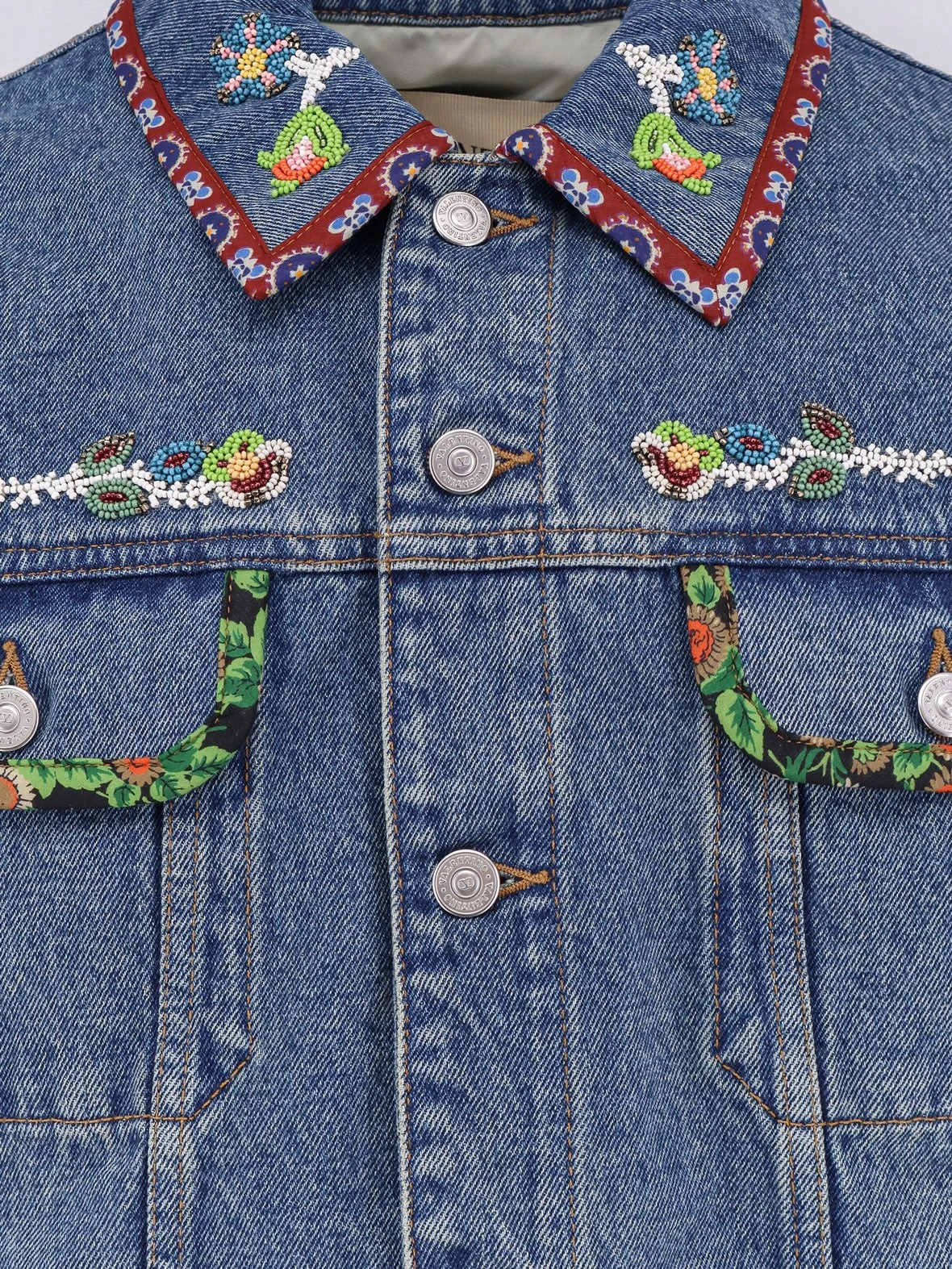 Denim jacket with multicolor embroidery.webp
