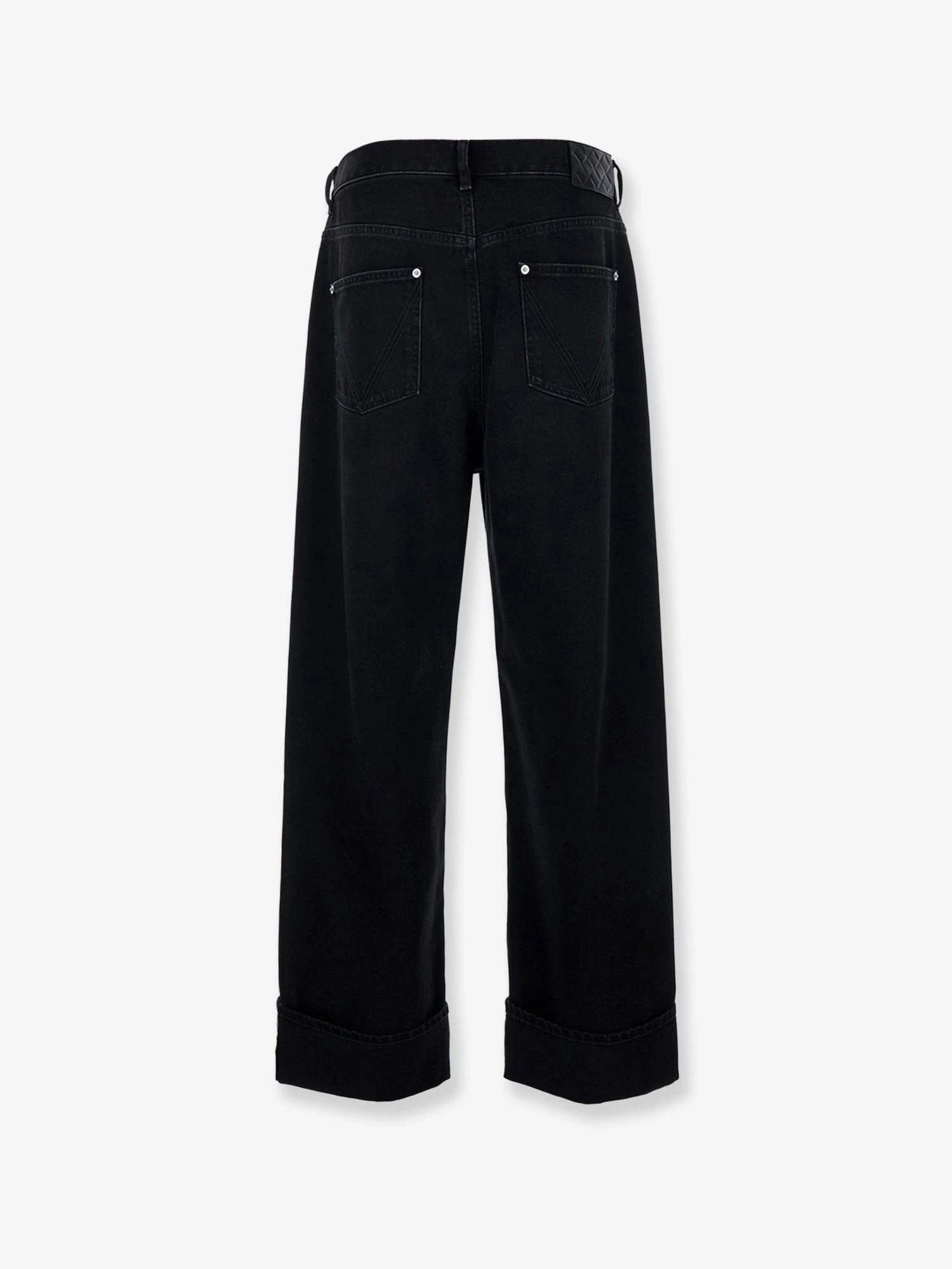 Black denim trousers.webp