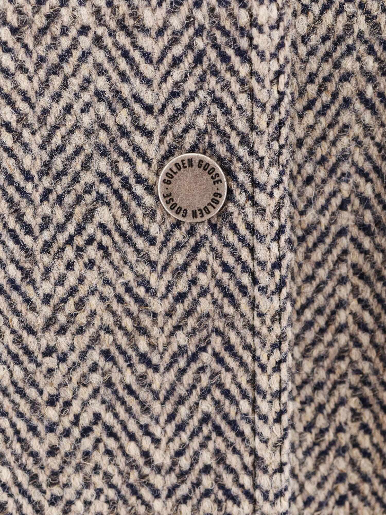 Herringbone fabric jacket.webp