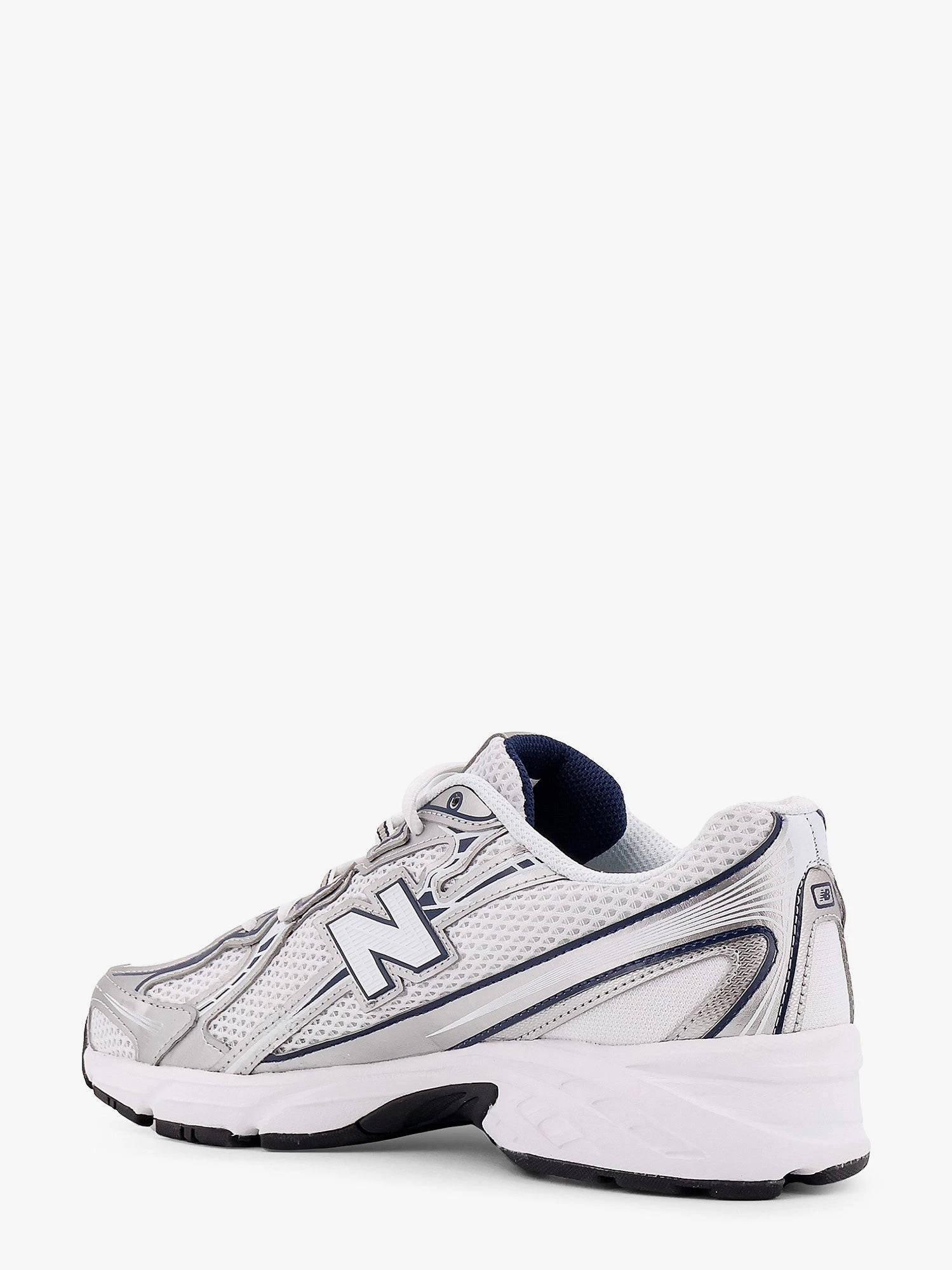 740 mesh sneakers with logo on the side.webp