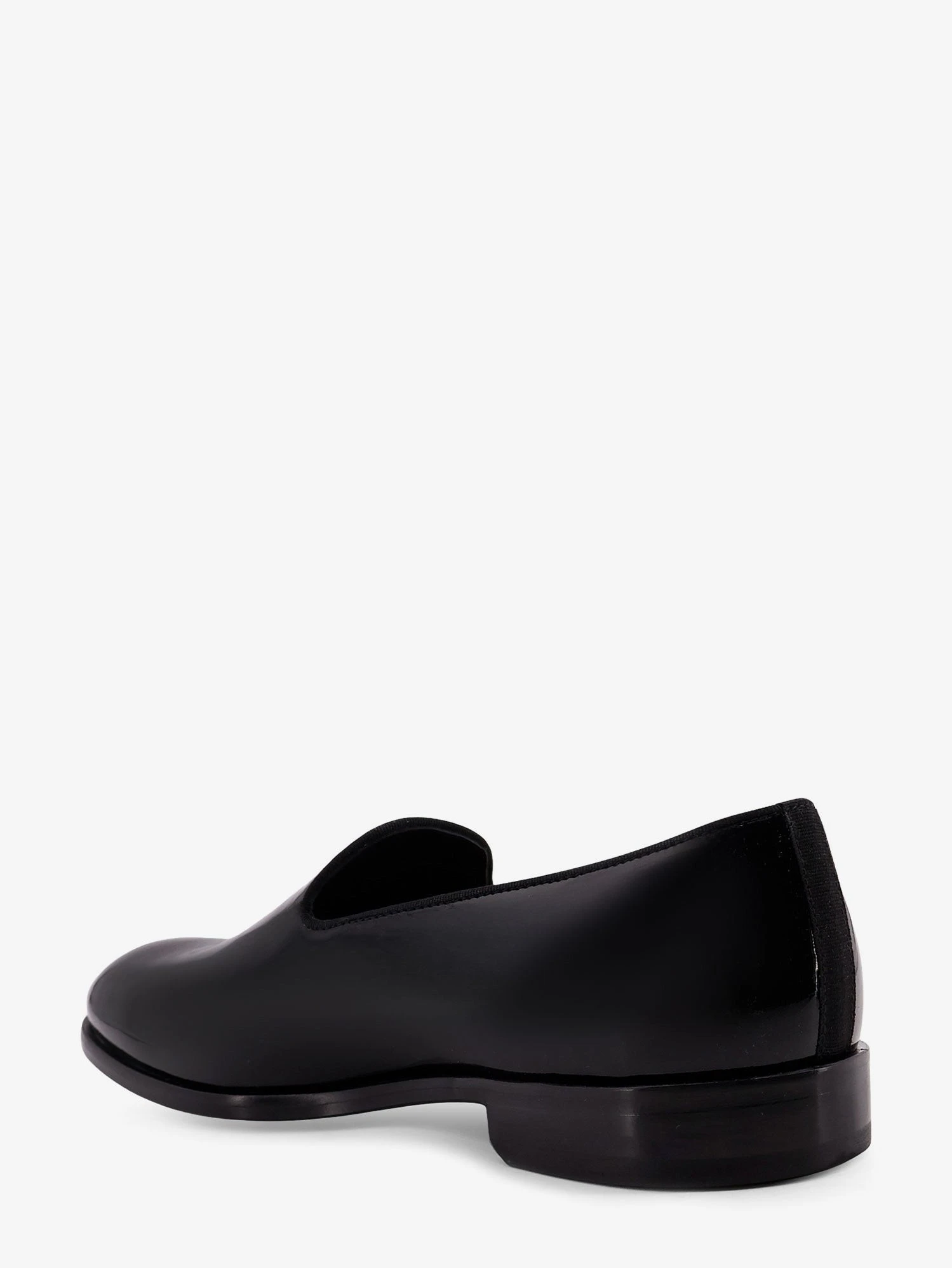 Patent leather loafers.webp