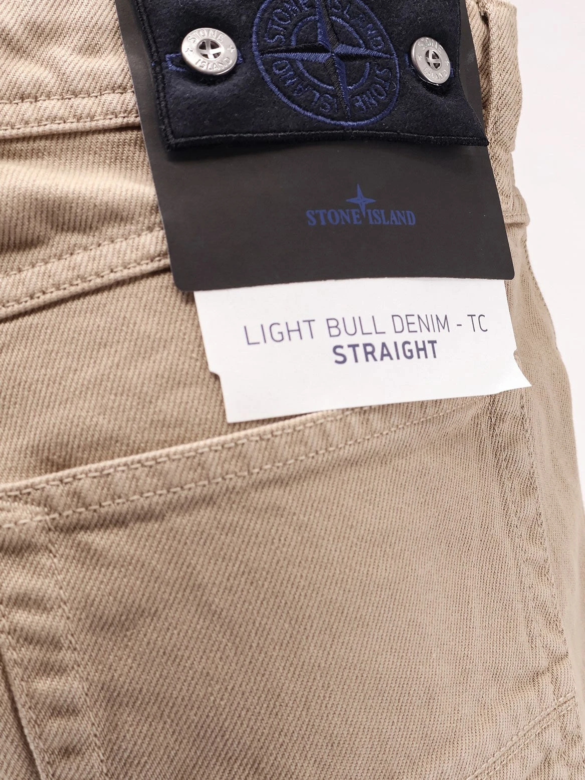 Denim trousers with logo patch on the back.webp