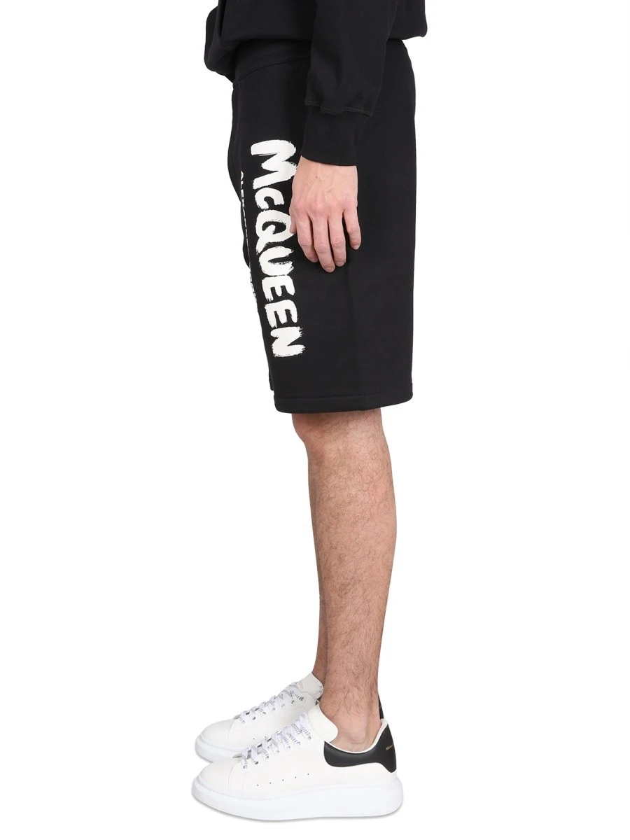 BERMUDA SHORTS WITH GRAFFITI LOGO PRINT.webp
