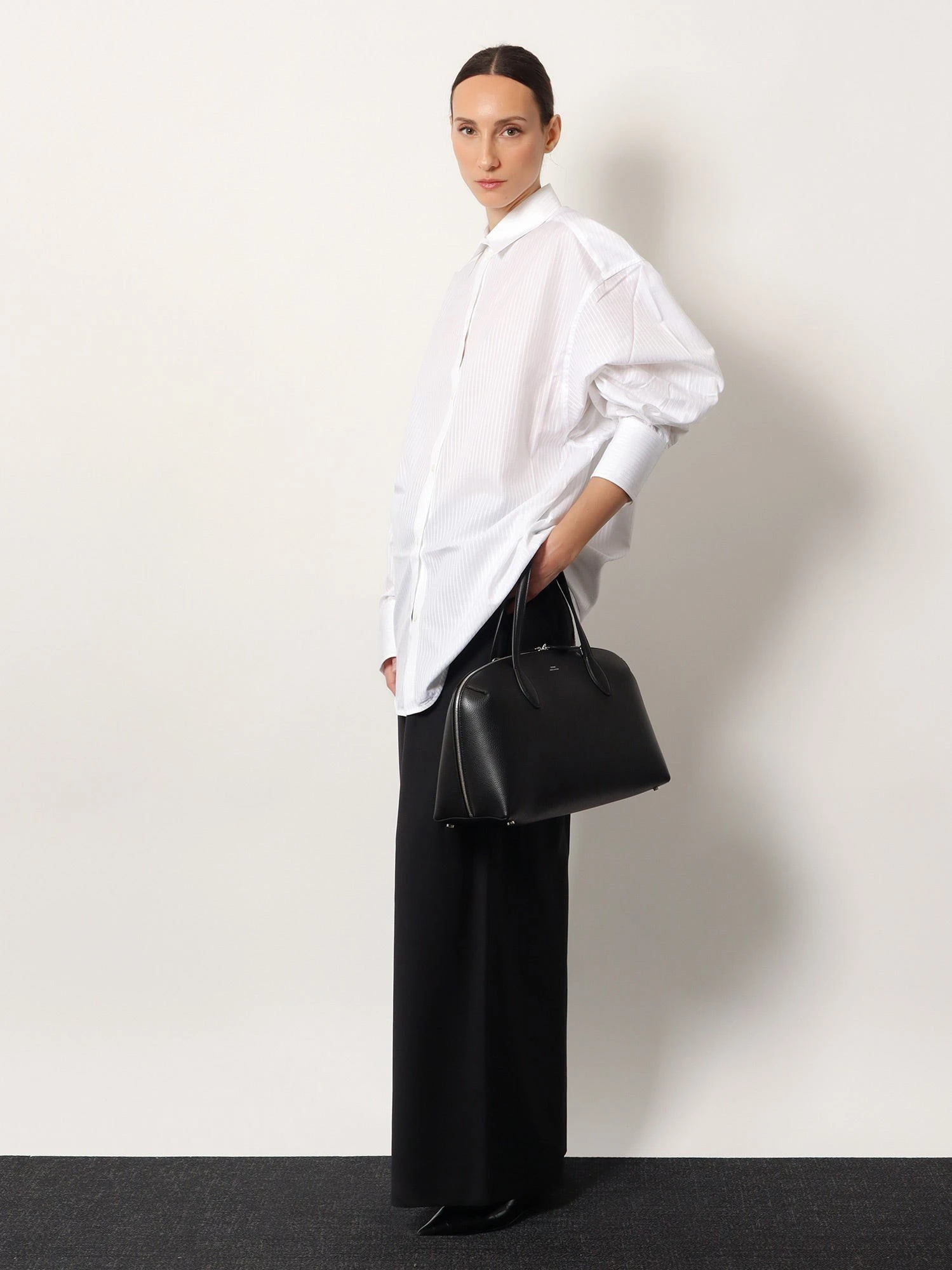 Hammered leather handbag.webp