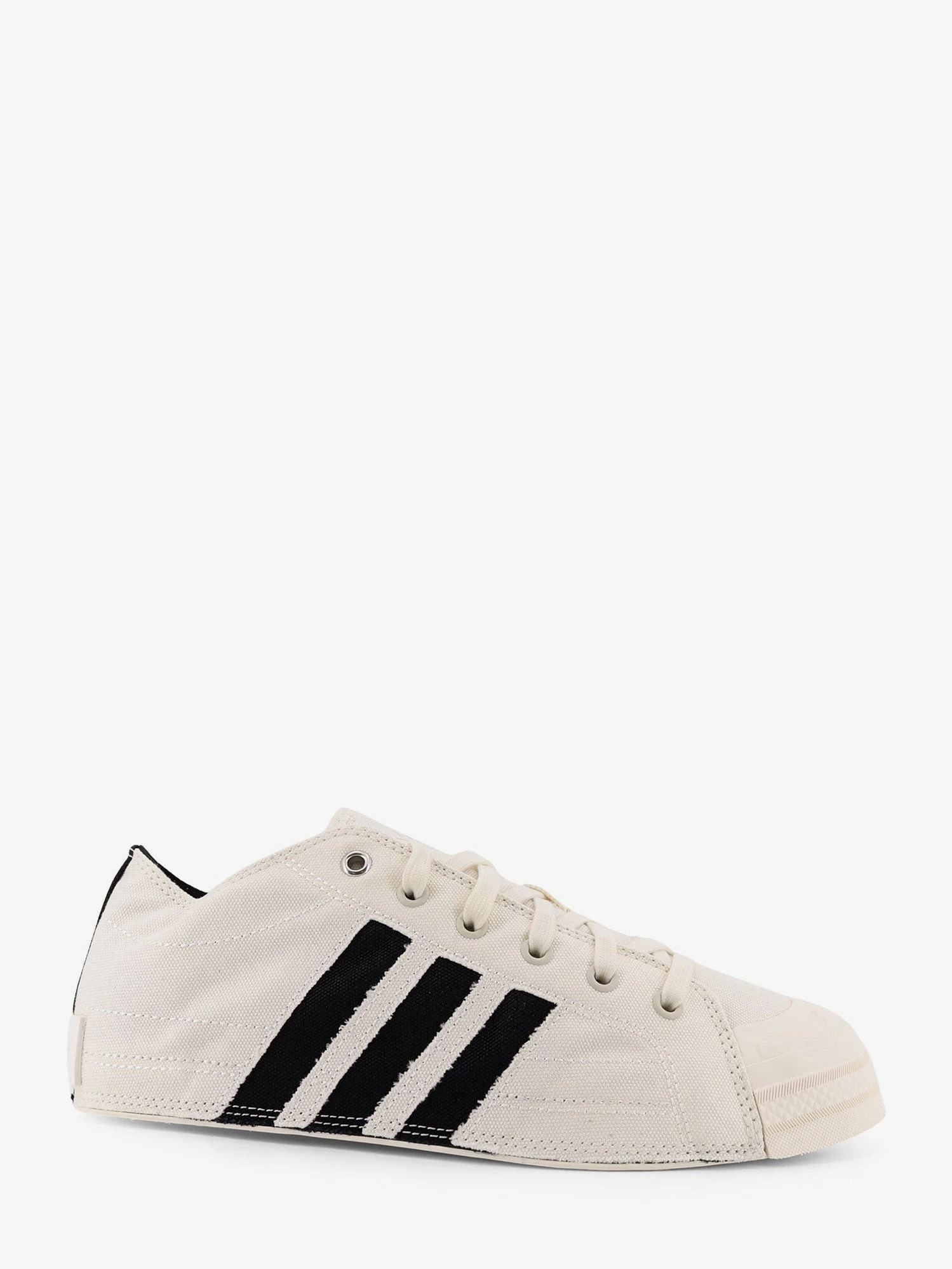 Canvas sneakers with logo on the side.webp