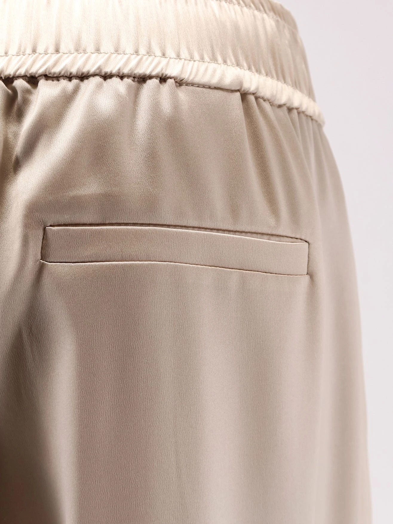 Stretch silk trousers.webp