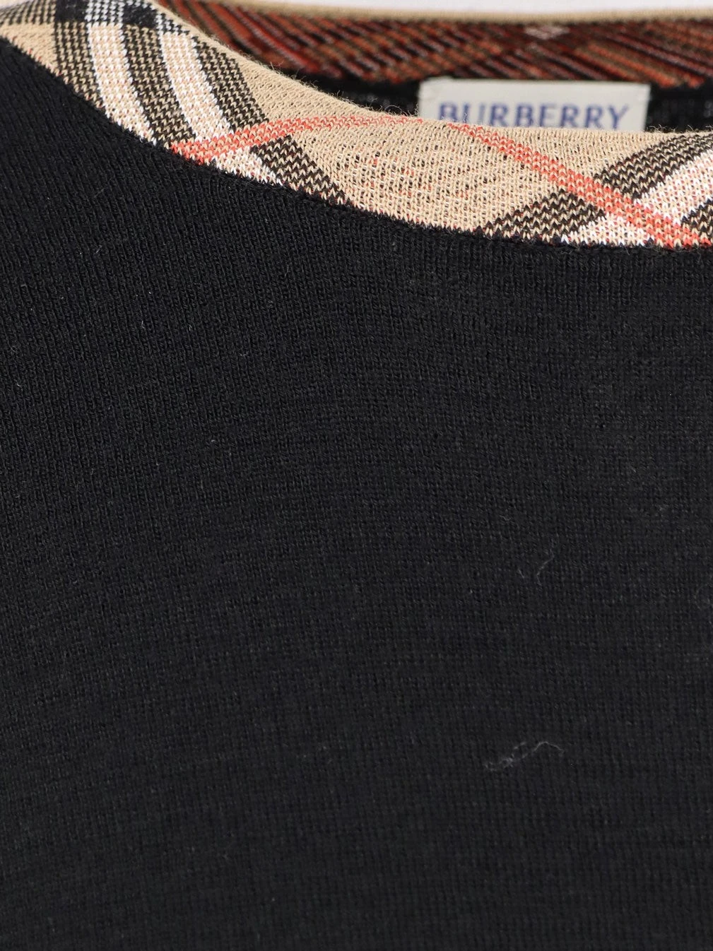 Wool sweater with Check profiles.webp