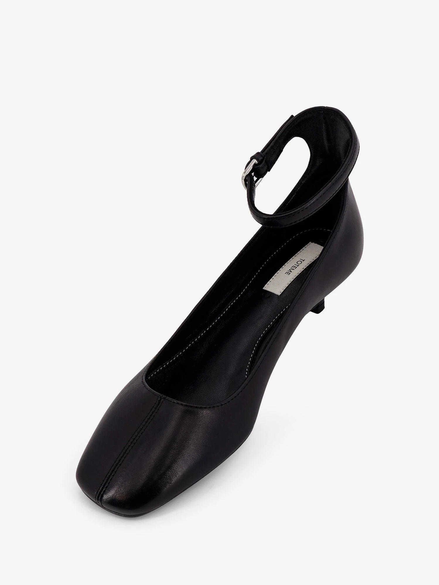 Leather décolleté.webp