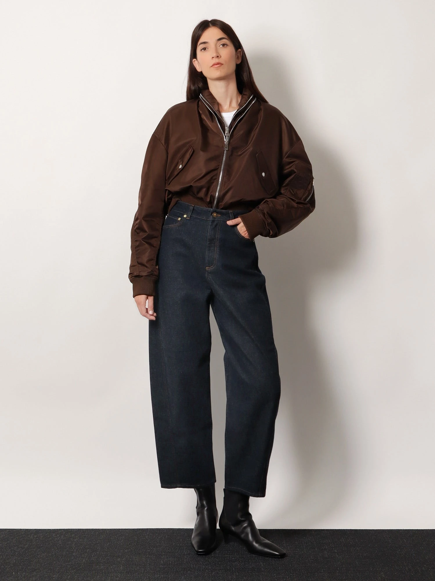 Twisted dark blue denim jeans.webp