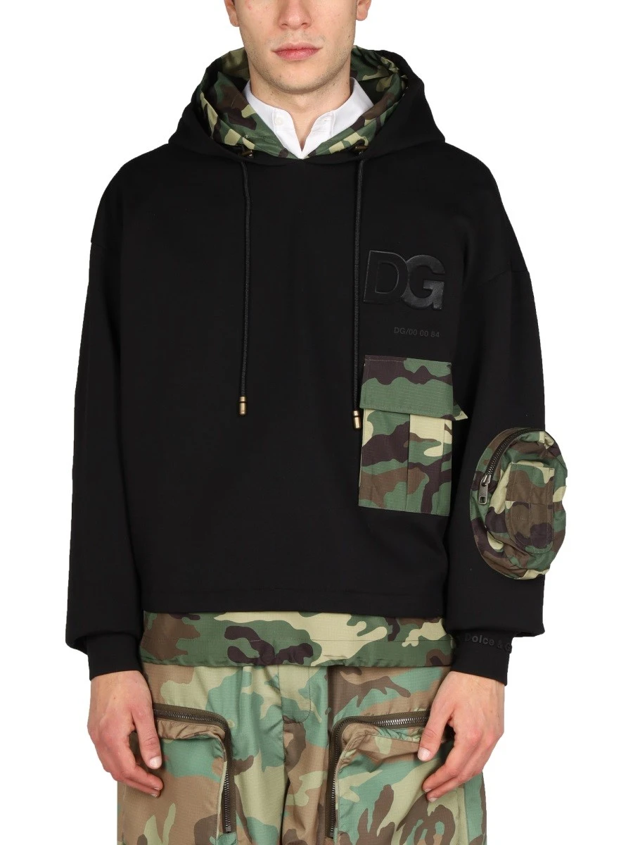 SWEATSHIRT WITH CAMO DETAILS.webp