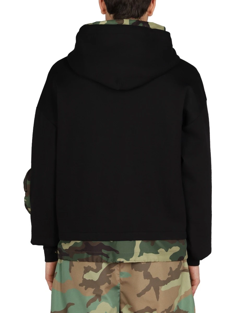SWEATSHIRT WITH CAMO DETAILS.webp