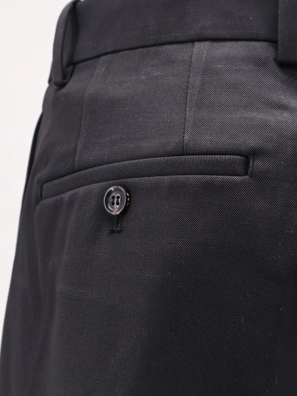 Wool blend trousers with frontal pinces.webp