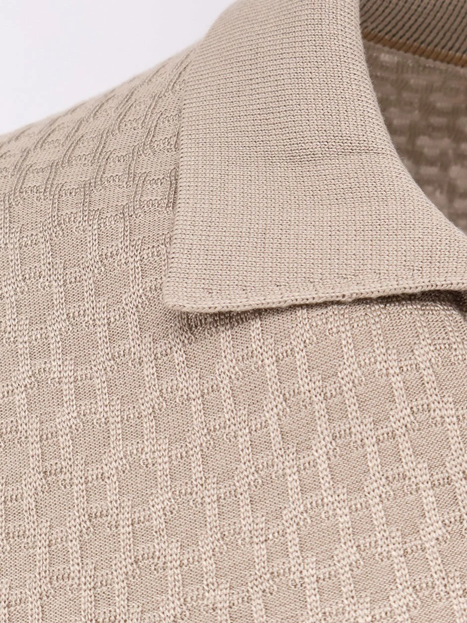 Silk sweater with all-over processing.webp