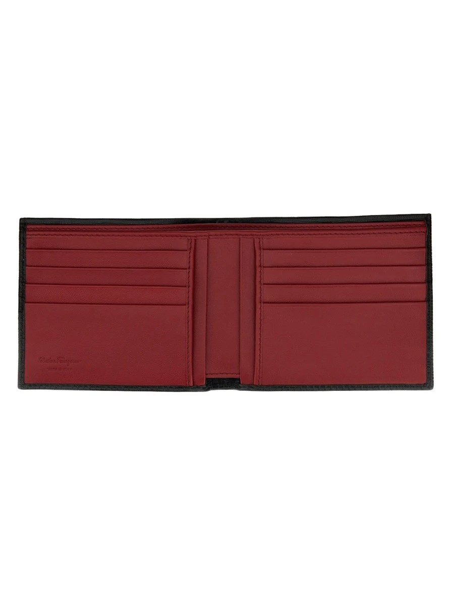 PORTAFOGLIO GANCINI.webp