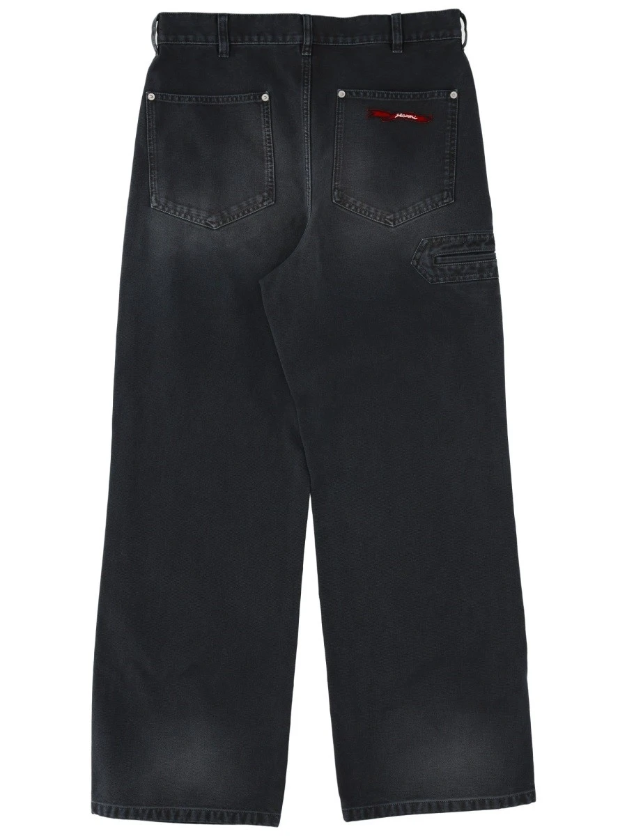 JEANS CON APPLICAZIONE LOGO.webp