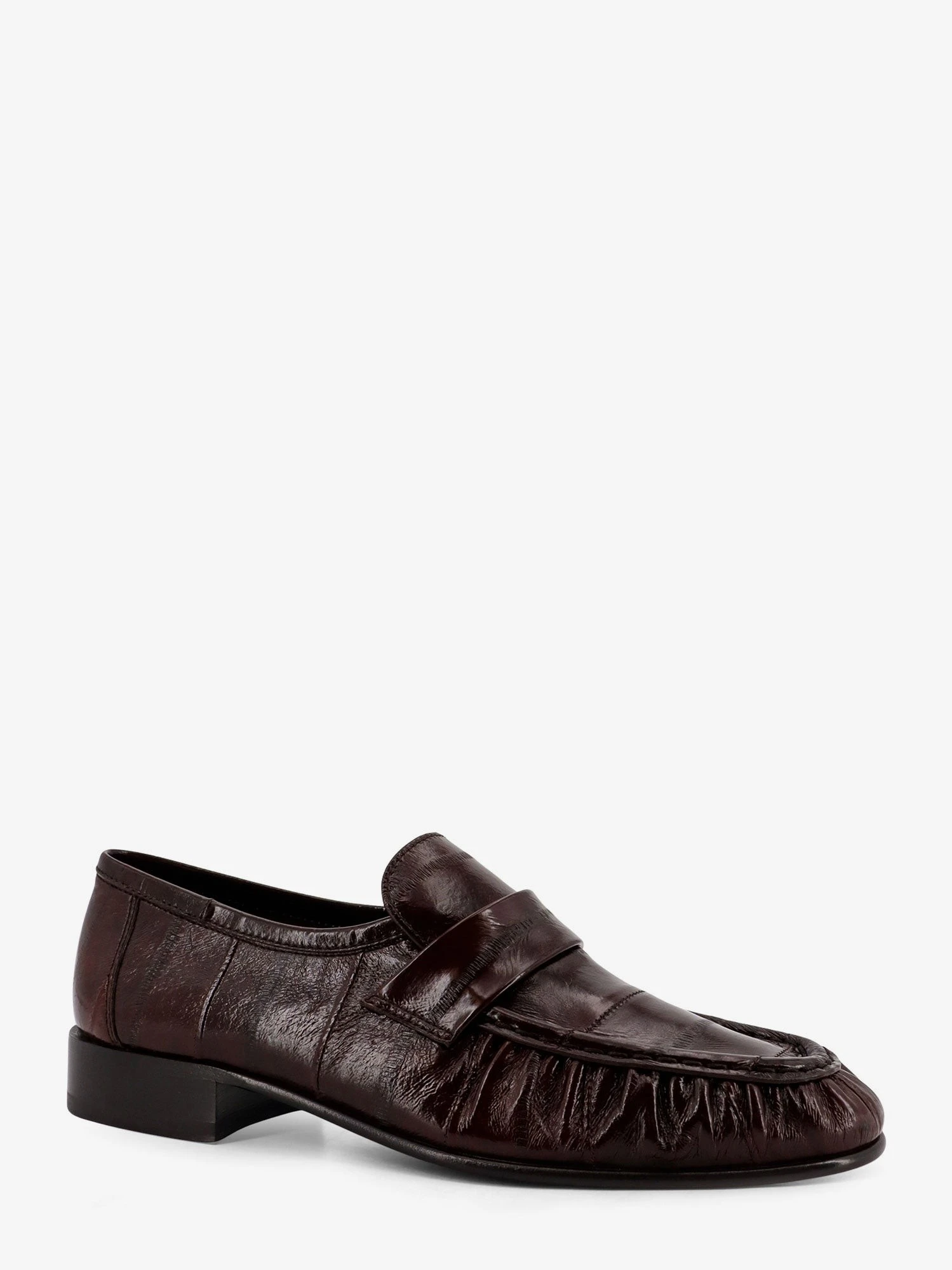Shiny leather loafers.webp