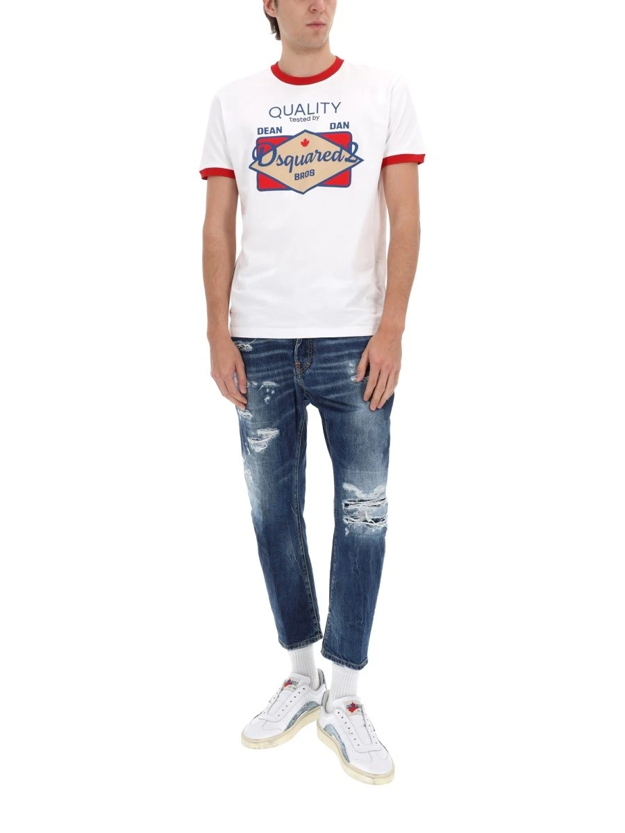 JEANS WITH "DESTROYED" DETAILS.webp