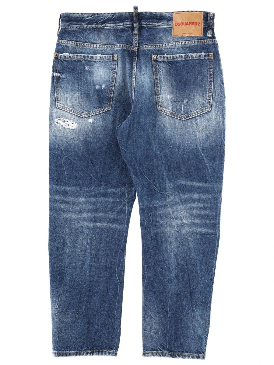 JEANS WITH "DESTROYED" DETAILS.webp