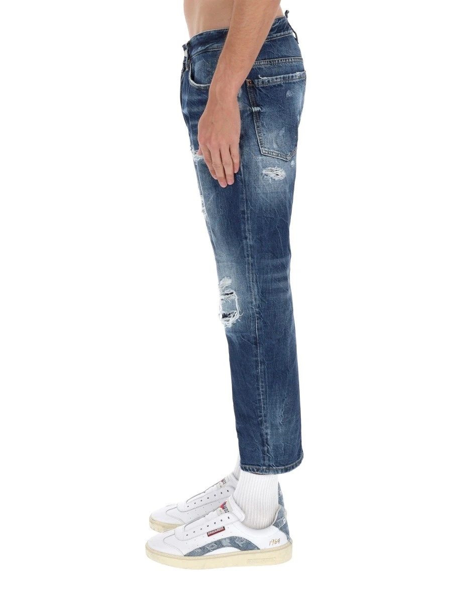 JEANS WITH "DESTROYED" DETAILS.webp
